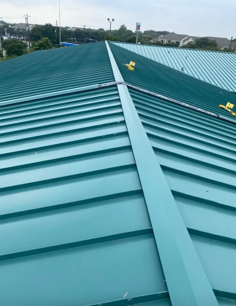 Green commercial metal roof ridge and valley for Metal Roof Repair in Grove