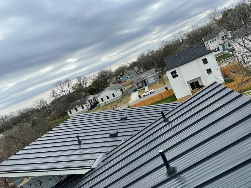 Standing seam metal roof panels with vents for Skylight Repair in Grove